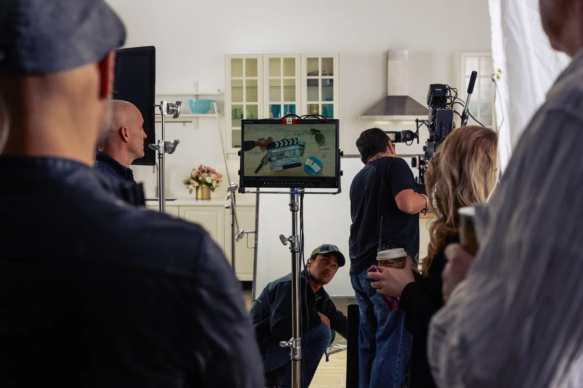 Zan Passante overseeing a StarKist commercial shoot on a kitchen set